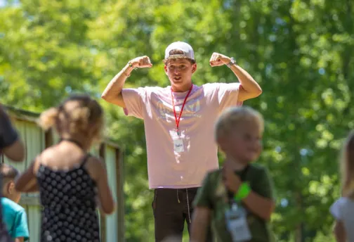 guy leading kids' recreation activities