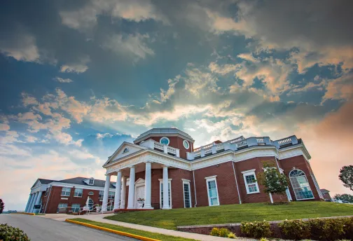 Sunrise with a campus building 