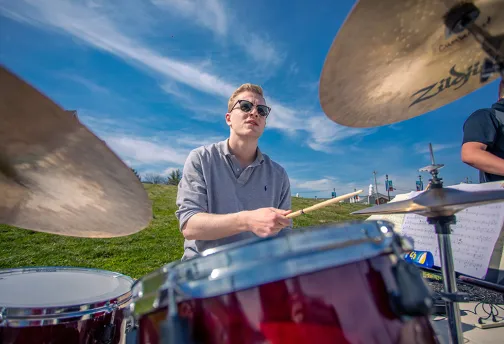 Jazz musician playing drum set