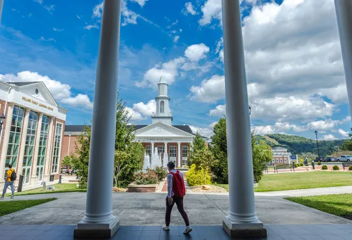 Students walk to class near the Grace Crum Rollins Center