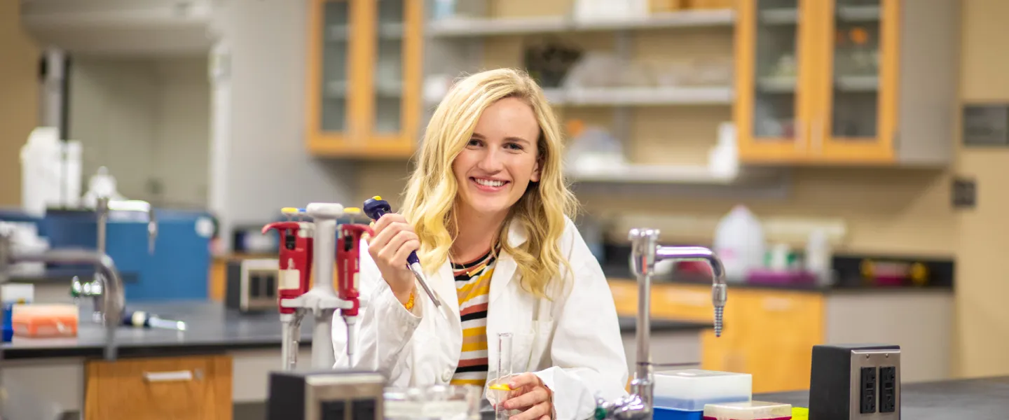 A biologist in a classroom