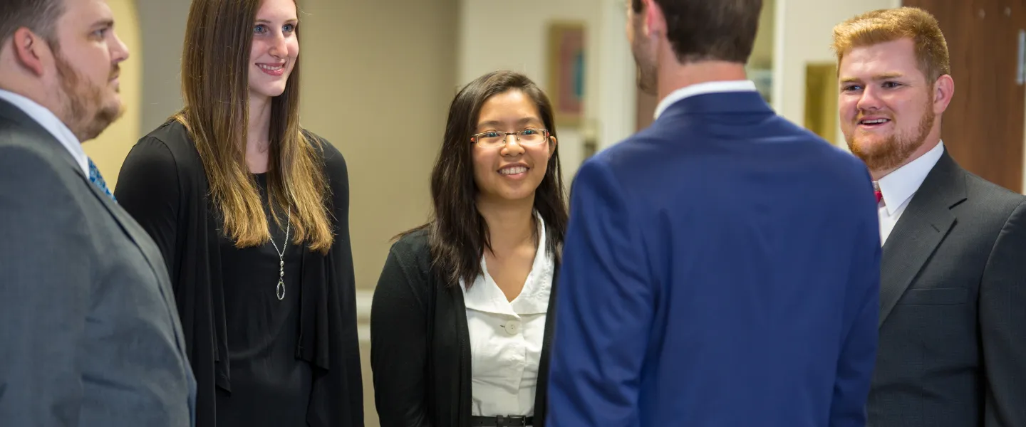 Young business people having a conversation