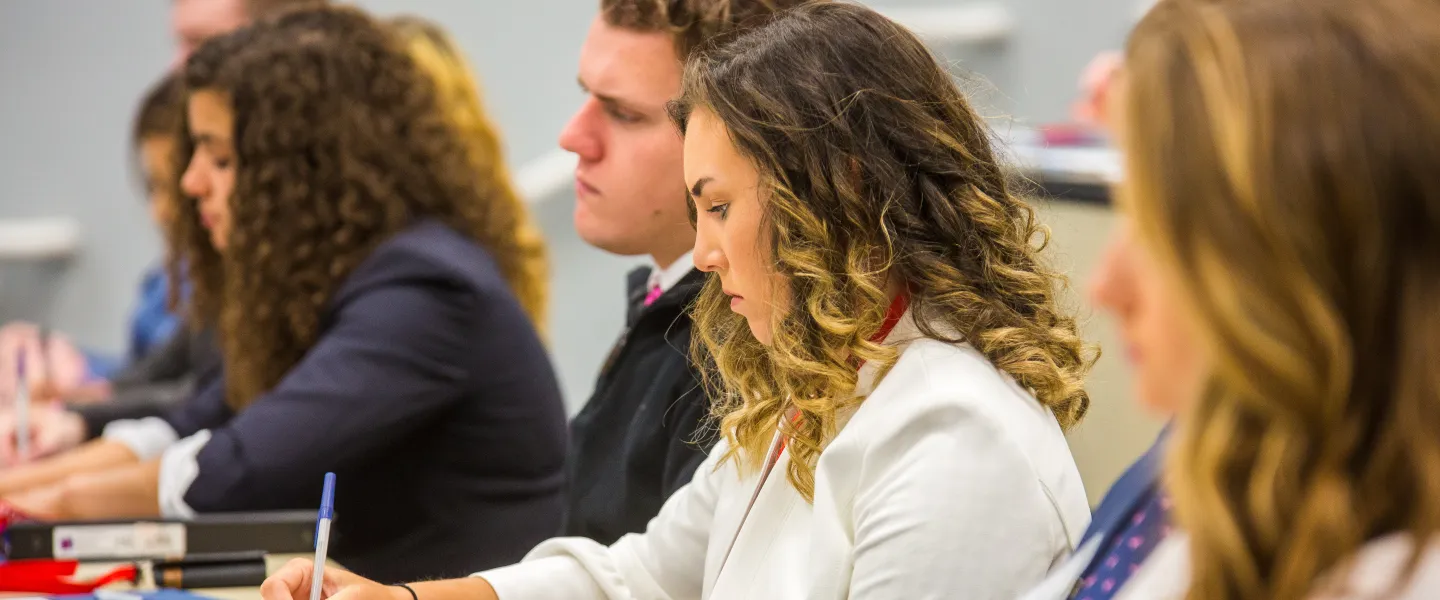 Students taking notes