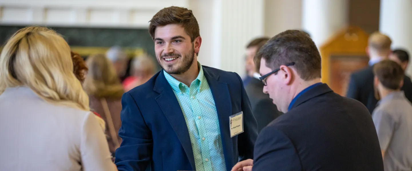 Graduate student networking with people