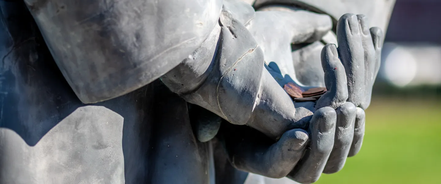A bronze statue on campus