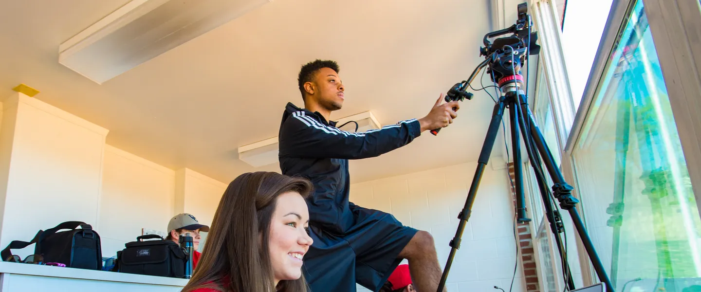 Students filming an event