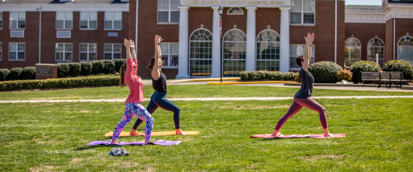 Yoga being done on the campus lawn