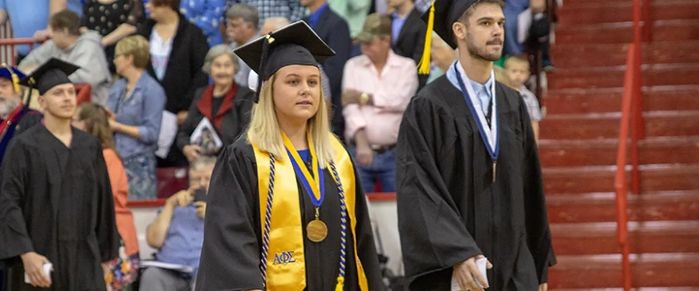 Students wearing cap and gown