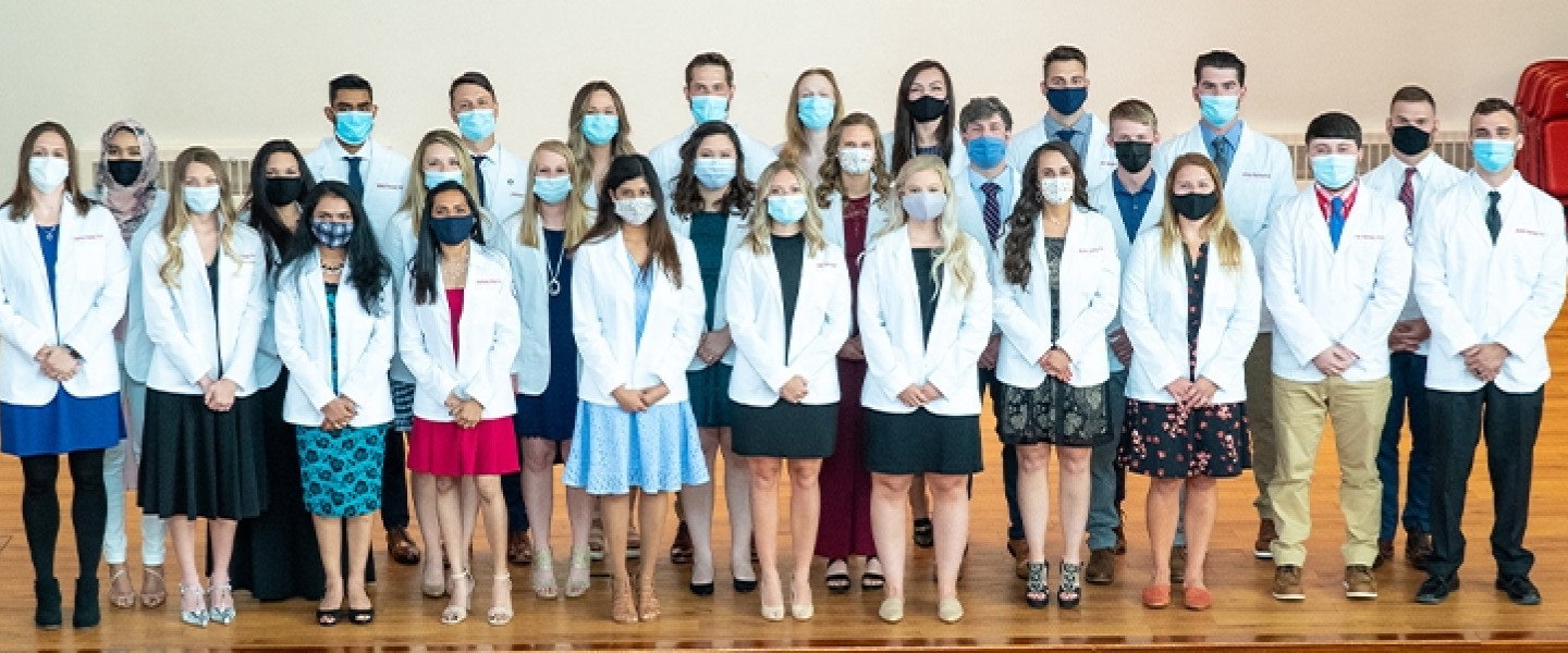 Students wearing physician coats