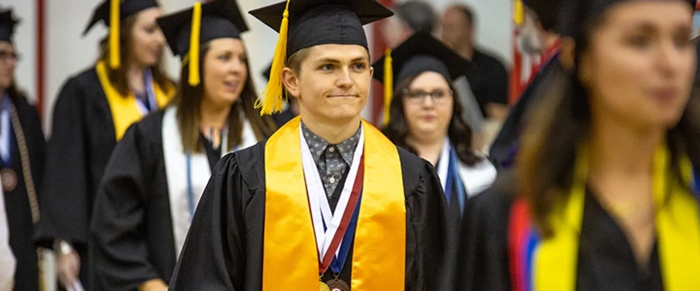 Students wearing cap and gown