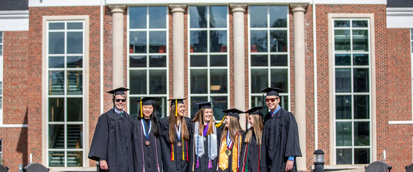 students wearing caps and gowns