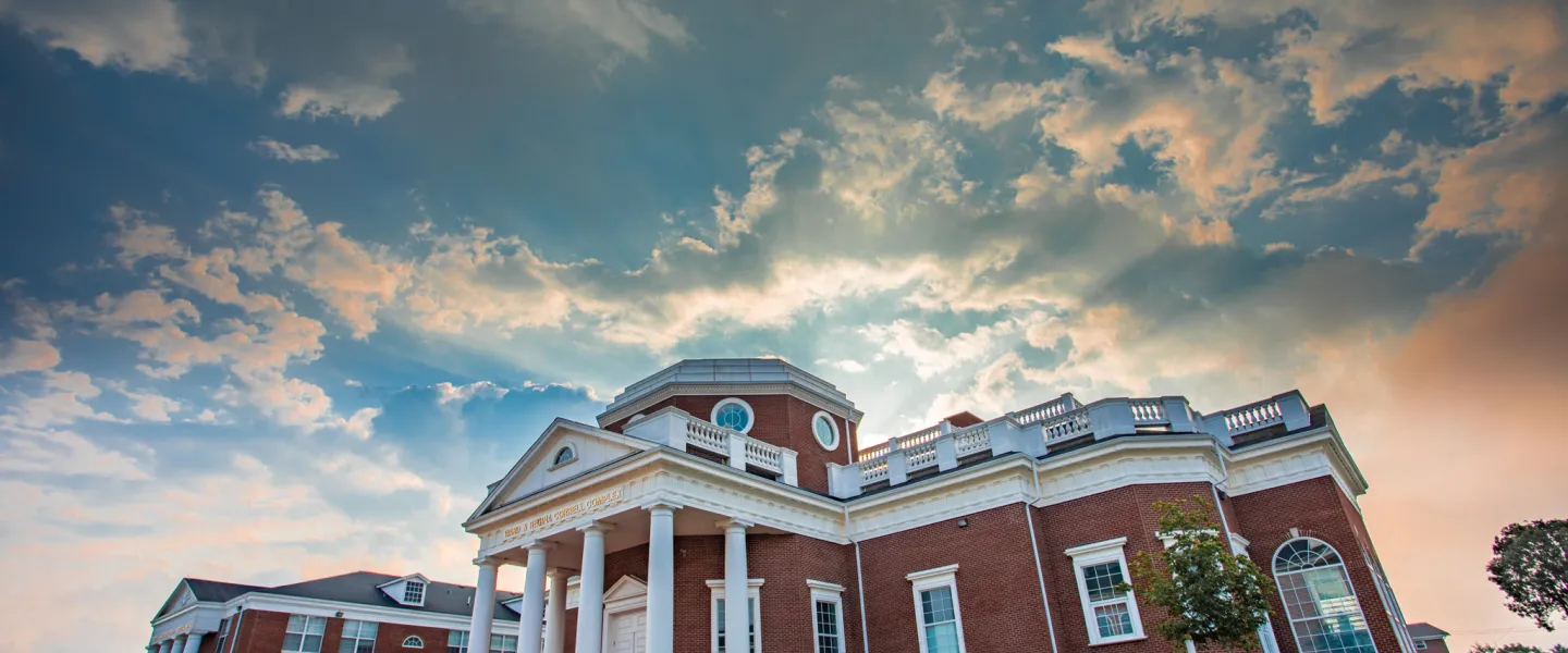 Sunrise with a campus building 