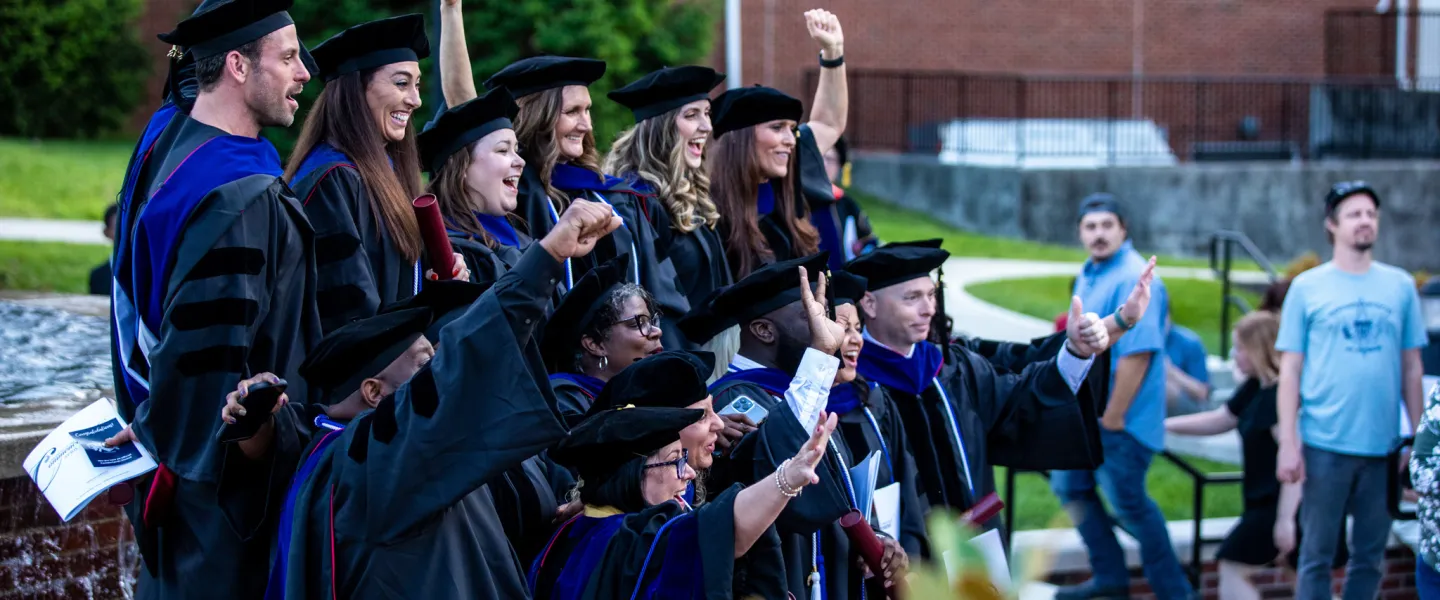 Students wearing cap and gown