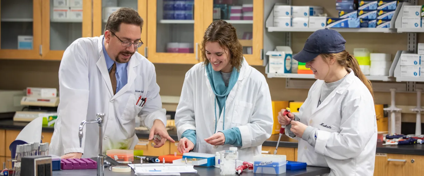 Three biologists working