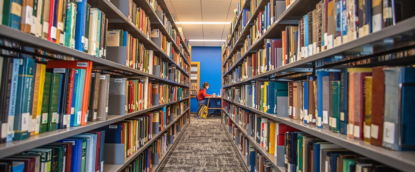 A student studying in a library