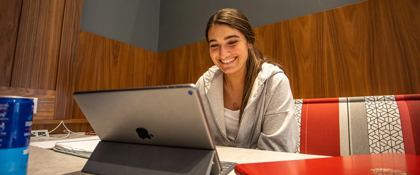 A student studying on a tablet