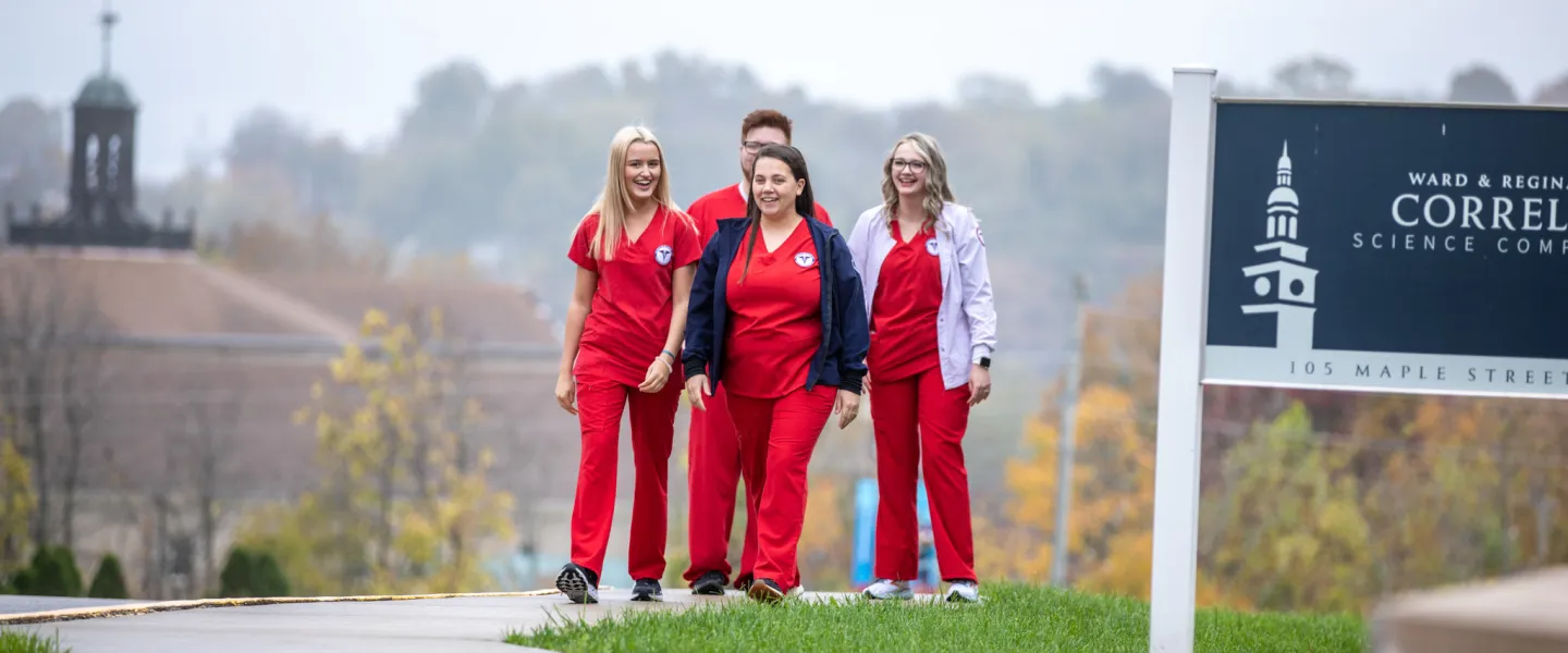 Nursing students walking on campus