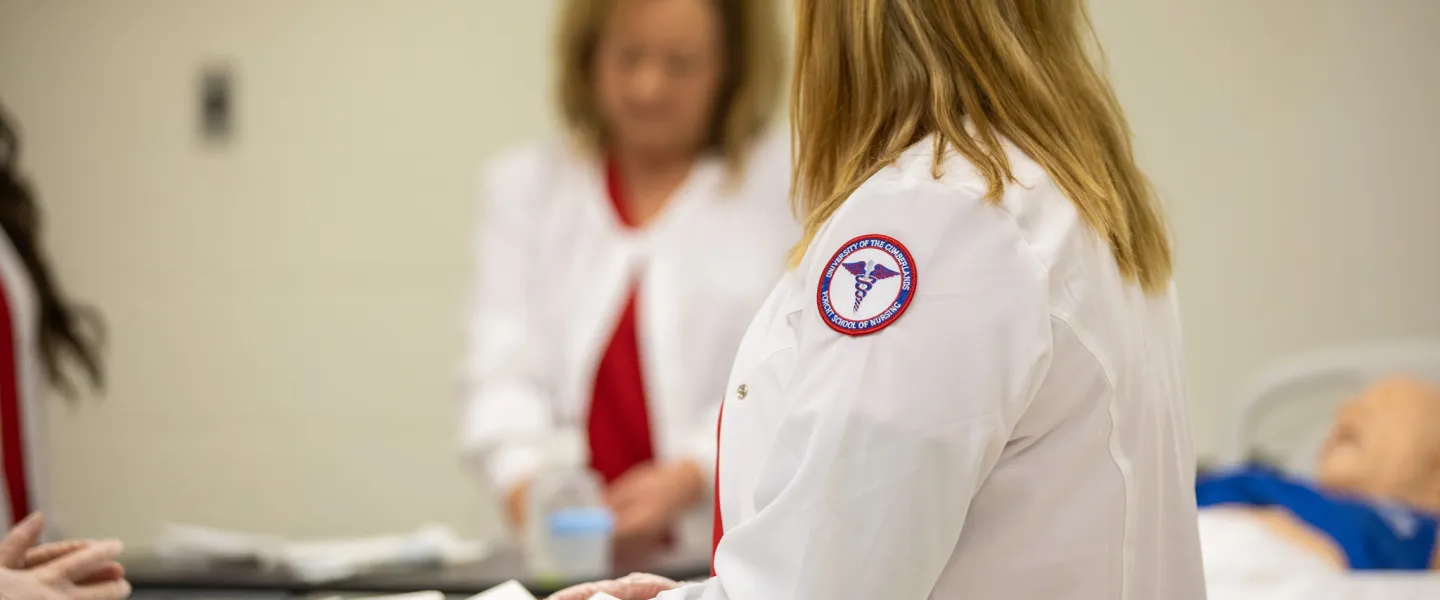 Nurses standing in the backround