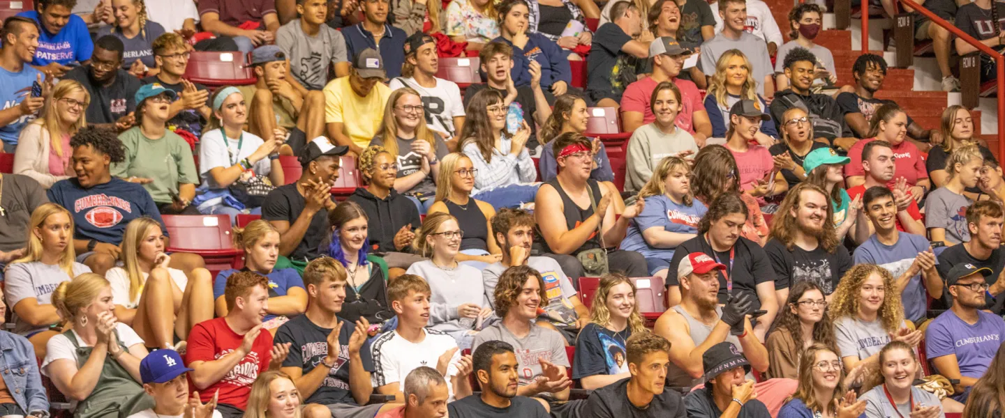 Students seated on bleachers