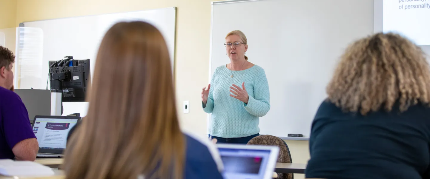 A counselor speaking to a class