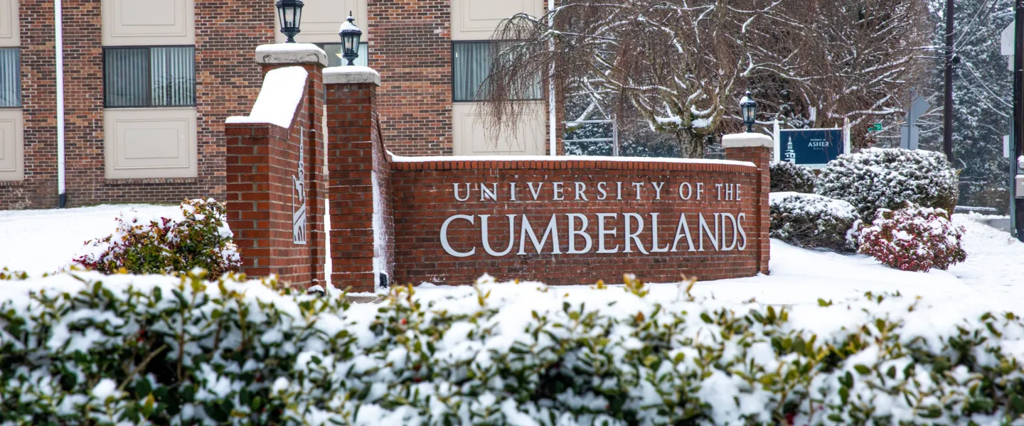 "University of the Cumberlands" on a brick wall in snow