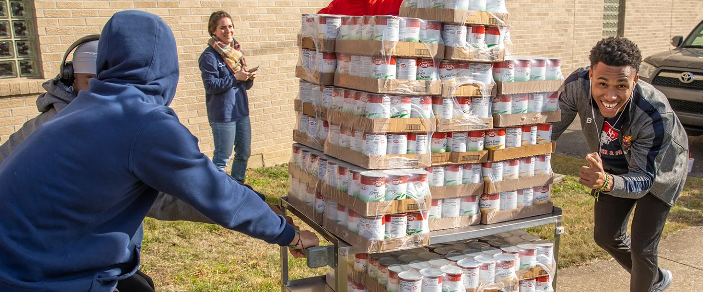 Students help deliver food to a local pantry 