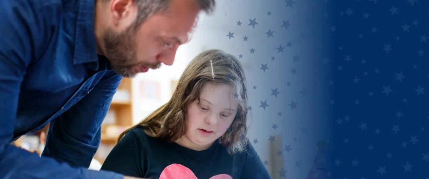 Special Education Teacher Working with Student