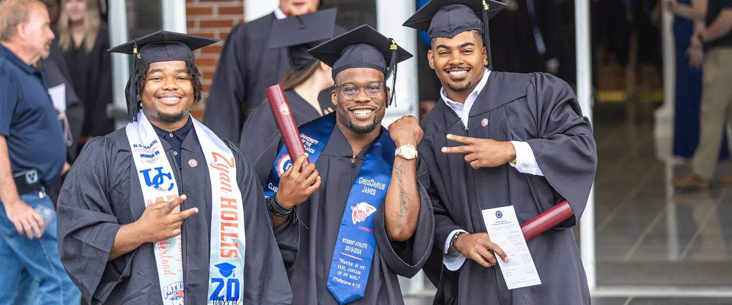 Three students celebrate their graduation at University of the Cumberlands.
