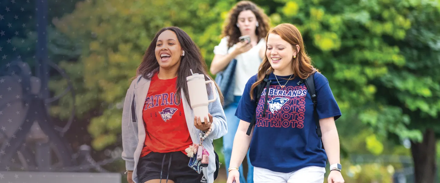 Students walk to class on campus. 