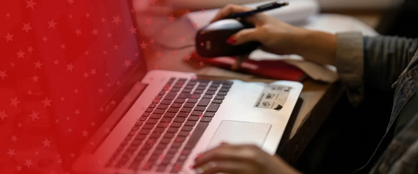 Computer Science Major Working on Laptop