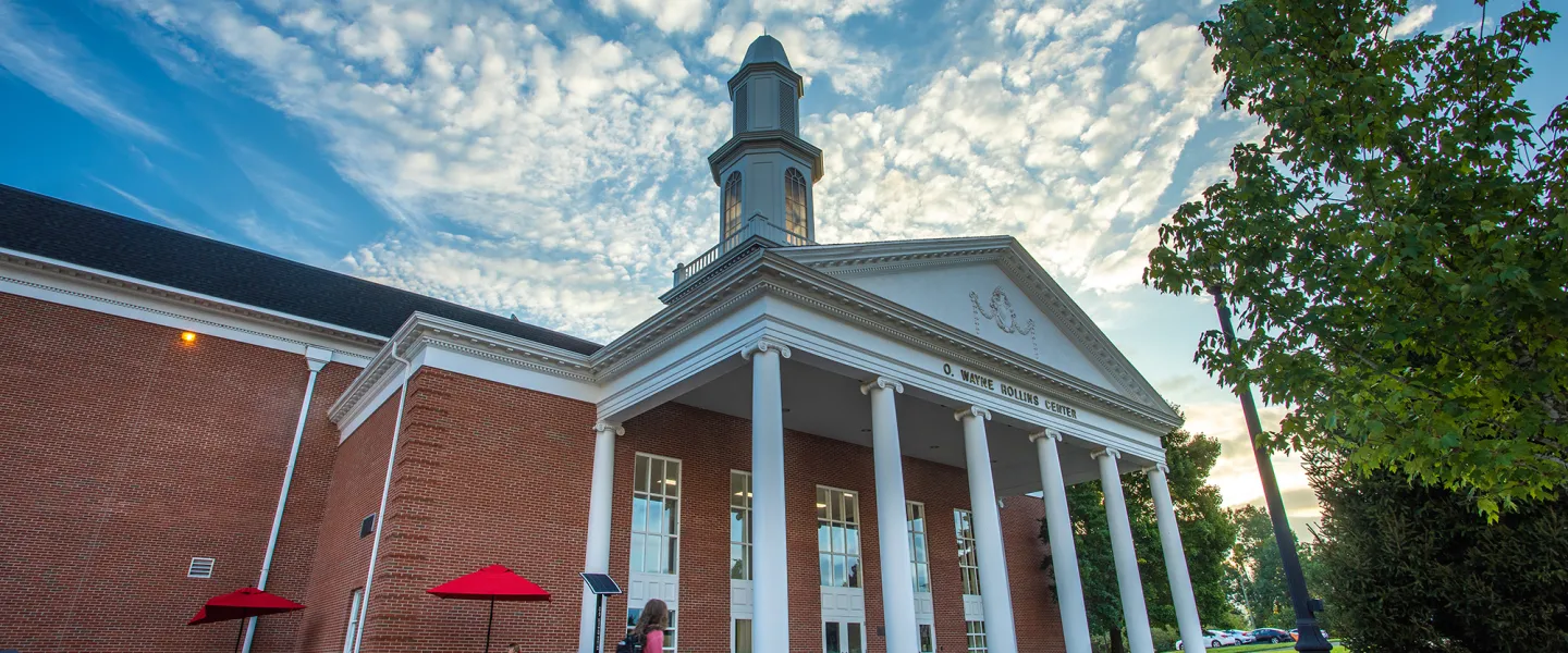 A student walks to class near the Rollins athletics center. 