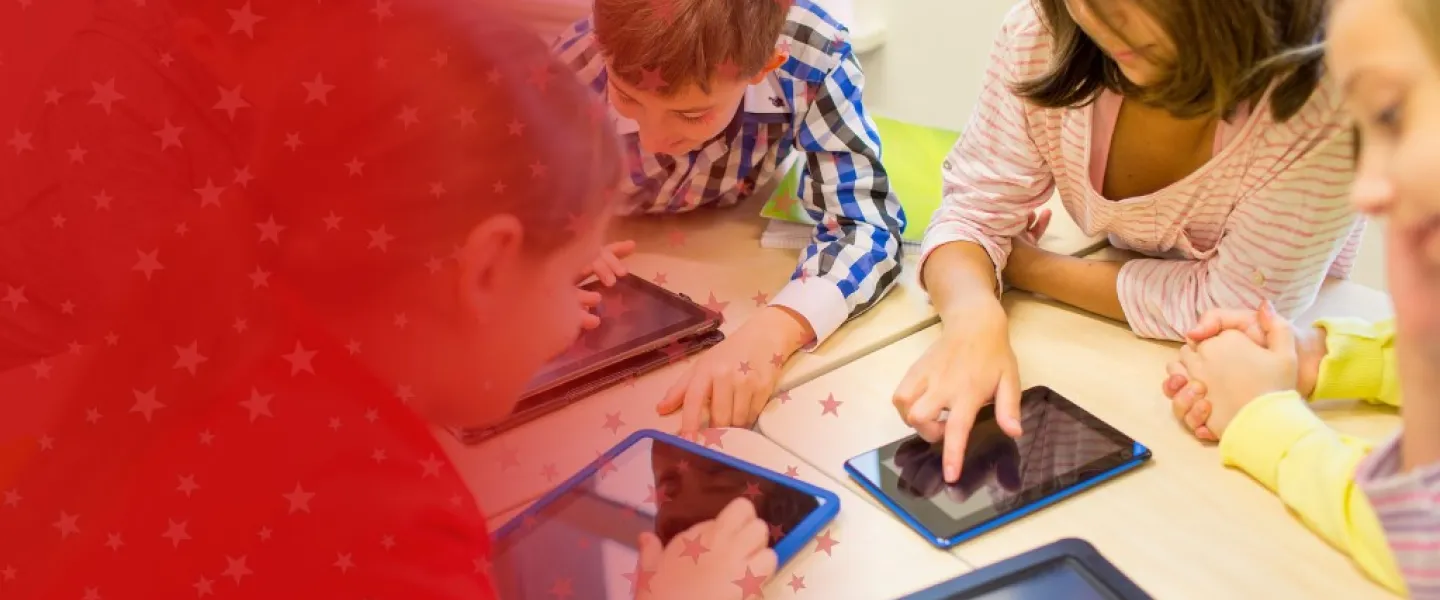 Teacher and Students Working with Digital Technology