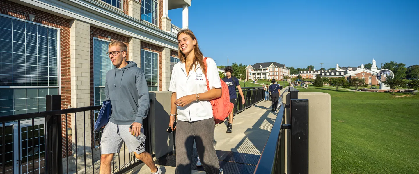 Students walk across the viaduct on the first day of classes. 