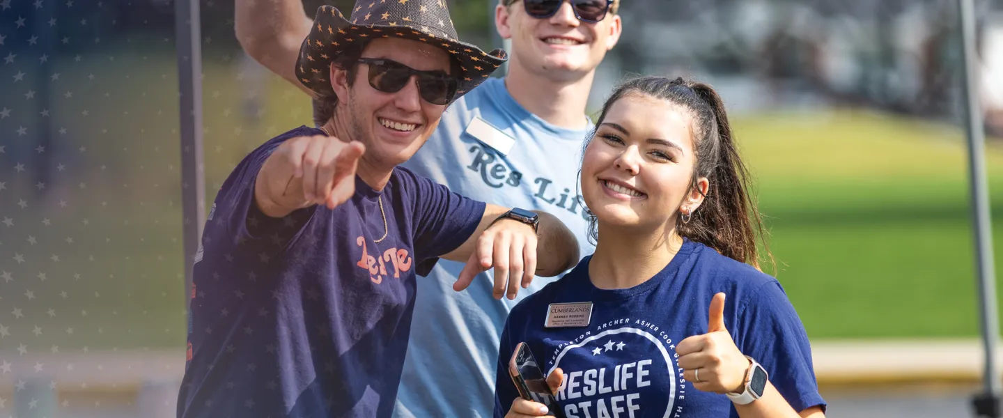 Resident life staff welcome students to campus. 
