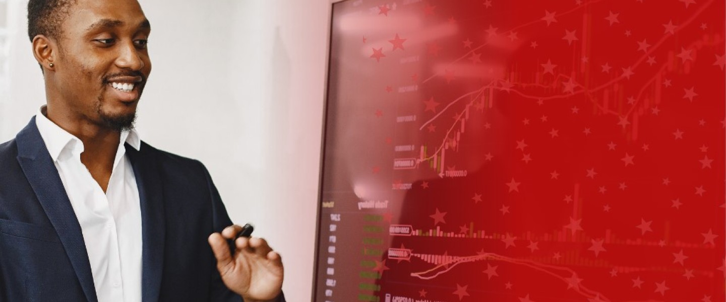 Man Working with AI on Computer Screen