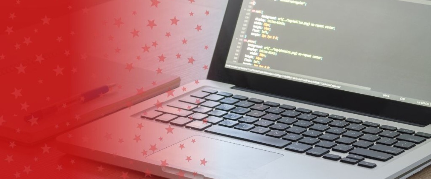 Laptop with HTML on Screen