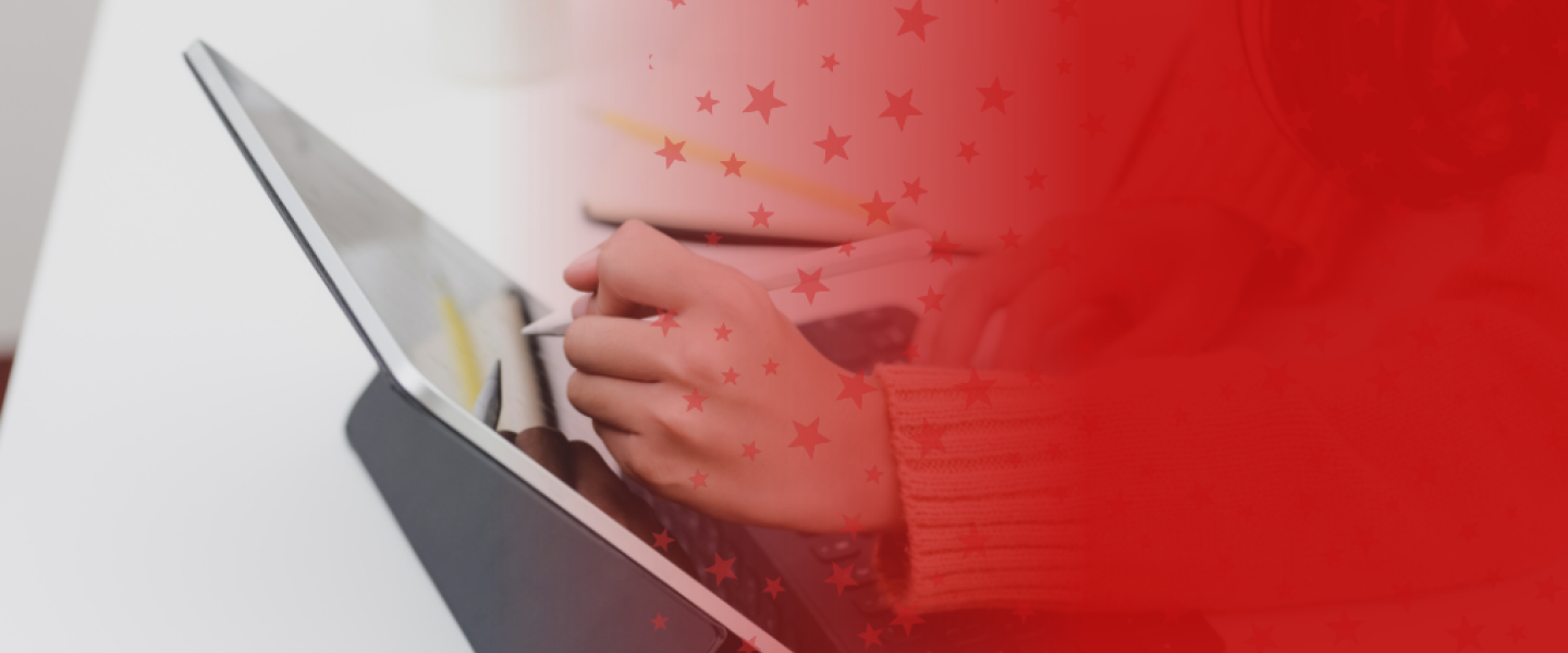 Person Writing on Tablet with Stylus