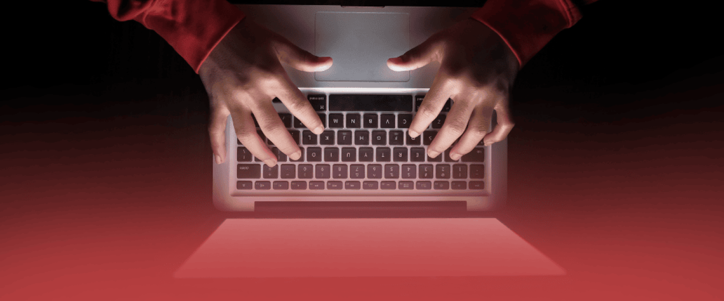 Laptop with Hands Typing