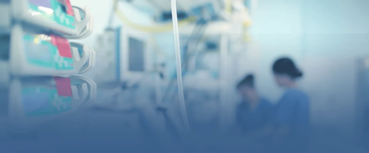 Medical Equipment with Nurses in Background