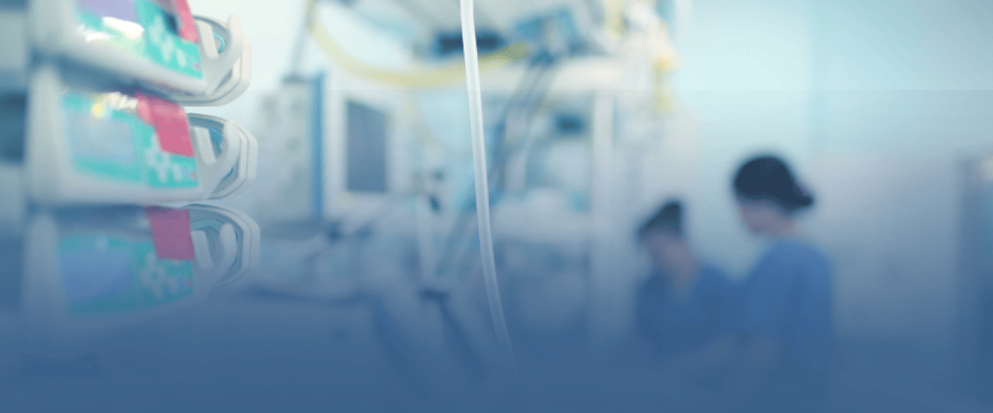 Medical Equipment with Nurses in Background