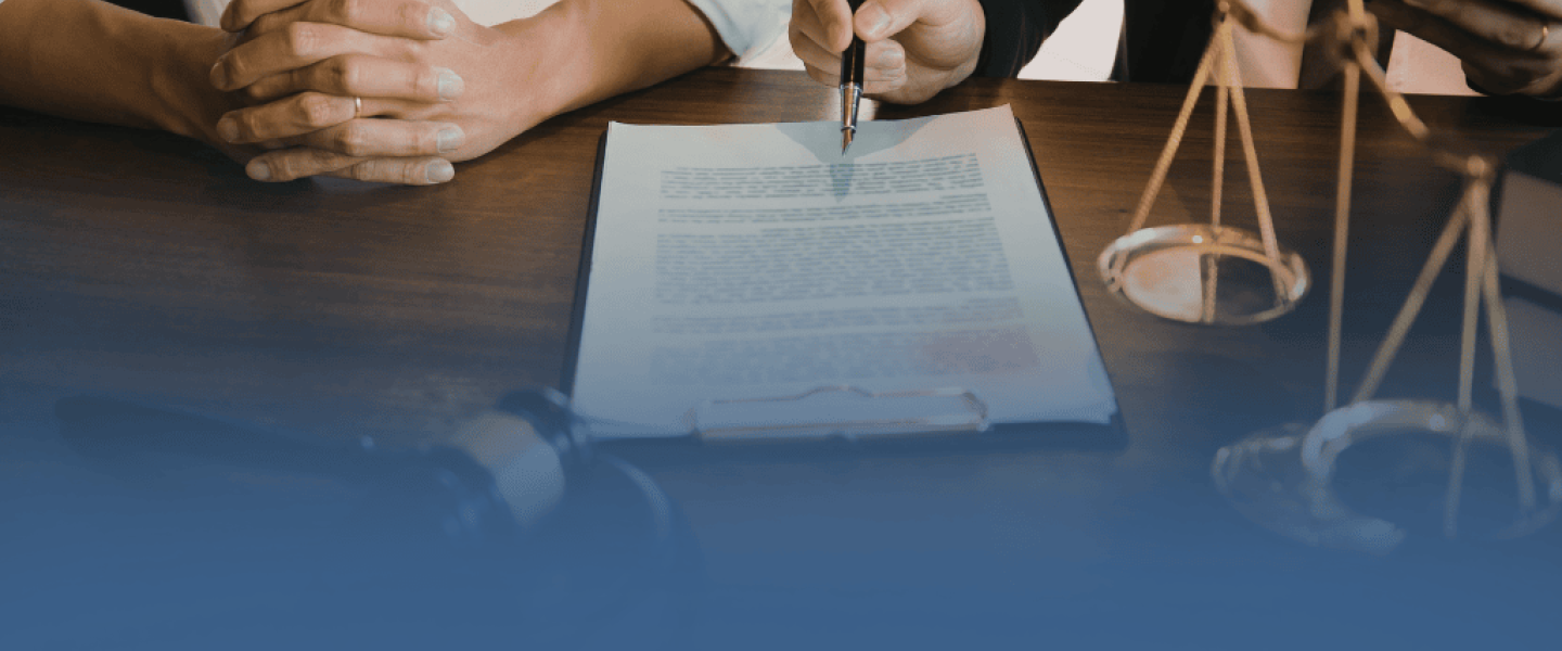 Paralegal with Pen and Legal Document