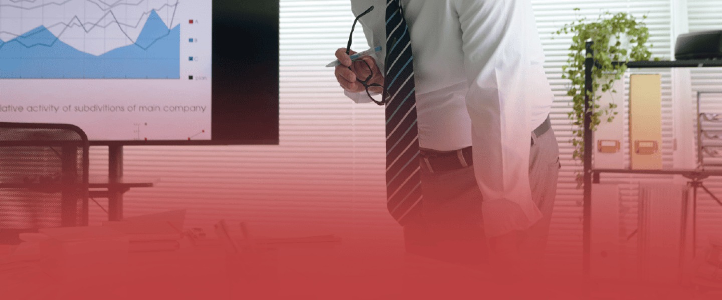 Project Manager Looking Over Desk