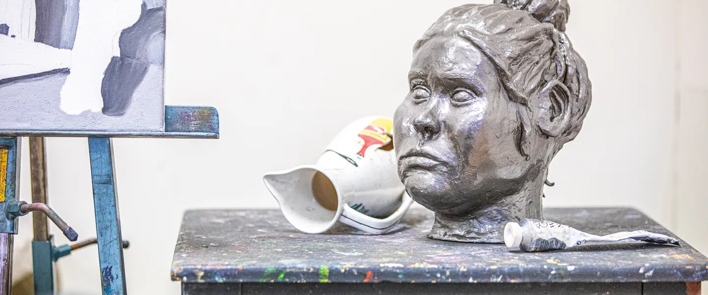 A artistic statue of a woman's head is displayed in Cumberlands art studio. 