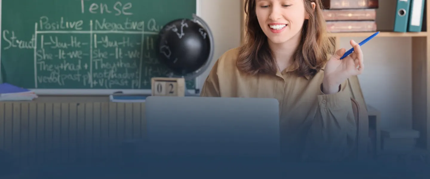 Teacher Working on Laptop