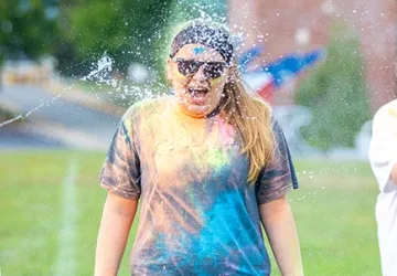 Students playing with super soakers