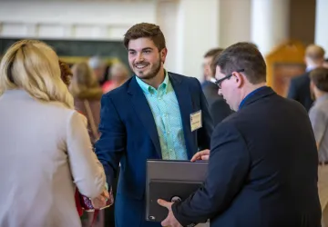 Graduate student networking with people