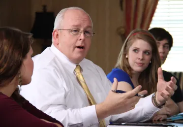 A teacher speaking to students