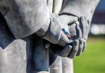 A bronze statue on campus