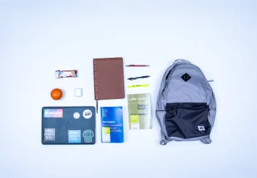 Everyday items found in a backpack