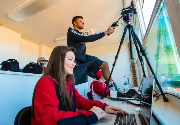 Students filming an event